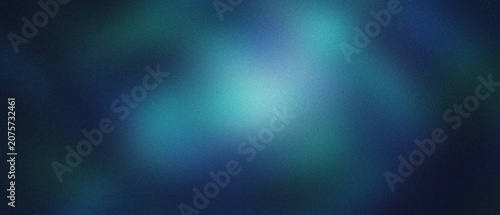 Abstract blue and teal bokeh background with subtle light diffusion and a luminous center creating a serene atmosphere