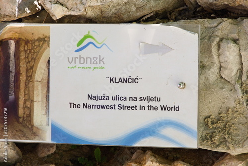 Sign for the Narrowest Street in the World in Vrbnik, Croatia