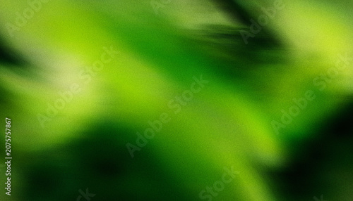 Abstract background featuring a soft gradient of vibrant lime green and deep forest emerald tones blended together with a subtle grainy texture for a smooth artistic digital design modern composition.
