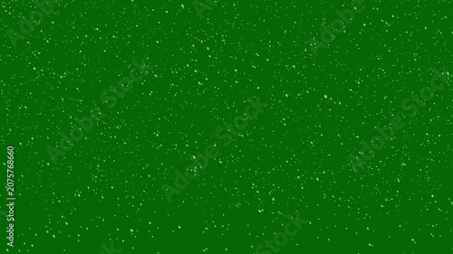 Realistic snow fall seamless loop animation. falling snowflakes isolated on green background. and snowfall for christmas and holiday design, motion graphics, slowly falling snow effect, 4k video