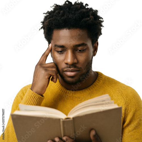 Student reading book isolated on a transparent background showing a thoughtful young Black man studying linguistics with copy space