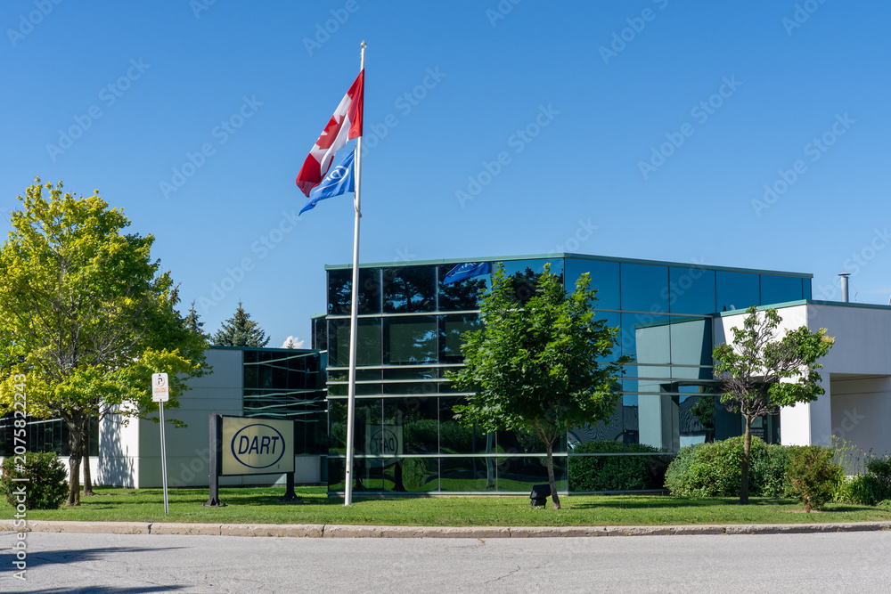Obraz premium Toronto, Ontario, Canada - June 27, 2026: Dart Container Corporation Canadian Office and Plant on Markham Road in Toronto, Ontario, Canada. Dart Container Corporation is an American manufacturer of di