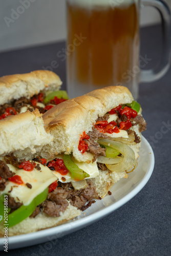 фотографія Philly Cheesesteak Sandwich with Mug of Beer