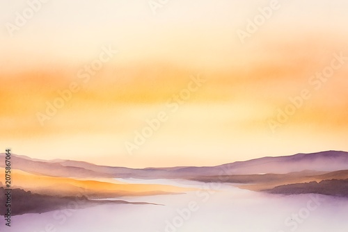Sunrise over misty mountains