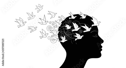 Conceptual Silhouette of Human Head Releasing Origami Paper Birds