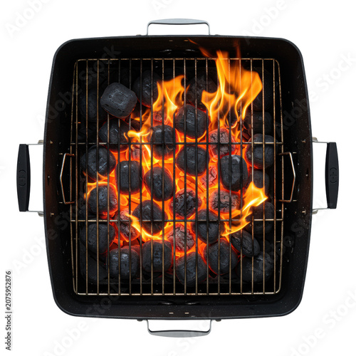 Sleek, matte black rectangular charcoal grill, overhead shot on white background with copy space, intensely glowing red/orange briquettes, vibrant flickering flames. Concept of intense summer grilling