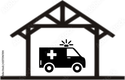 A black and white logo featuring a stylized ambulance vehicle with a roof light and medical cross symbol parked inside an open-front shed or garage building with a gabled, trussed roof structure.