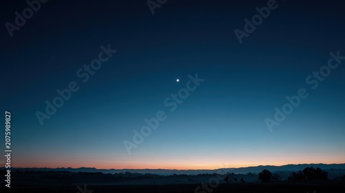venus. The morning star visible above the horizon before sunrise in a dark blue sky. travel magazines, destination branding, designed for travel destination branding, used by web designers.