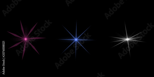 Принти на полотні Assorted collection of shining starburst light flares in varied colors for enhancing digital graphics on black background
