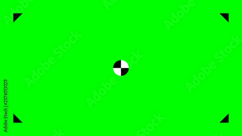 Fotografie Chroma key green screen background with black corner markers and a checkerboard center tracking target for vfx video production post processing template