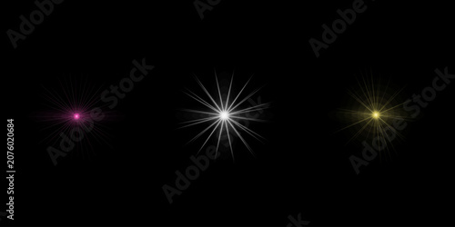 Collection of elegant star light effects isolated on black background for digital graphic design and creative visual art work.