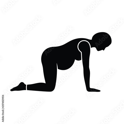 Pregnant woman in a quadruped position, performing prenatal yoga or exercise