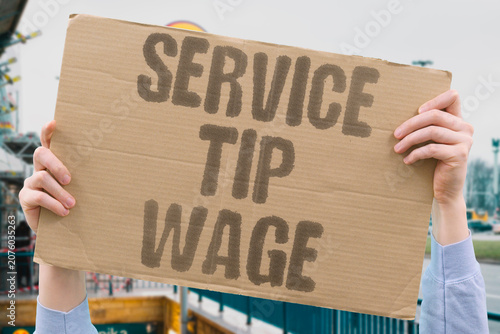 Fotografija "Service tip wage" Tipped workers rely on gratuities