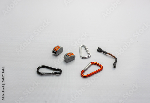 Foto devices for connecting and fastening various parts and assemblies, carabiners, w