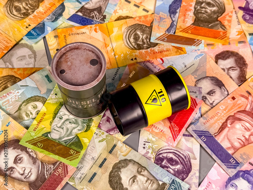 фотографія Currency bills scattered with film canisters on a flat surface