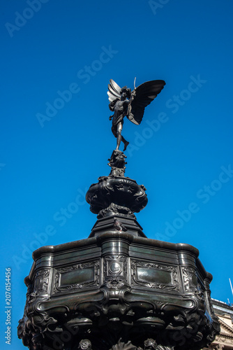 Eros statue in Piccadilly Circus London
Eros statue on the Shaftesbury Memorial Fountain in Piccadilly Circus, London, photographed against a clear blue sky with copy space.