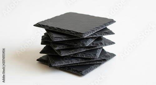 Stack of black slate tiles for flooring and construction