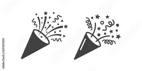 Photos Party poppers with confetti and stars on white background