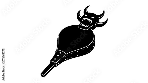 Fotografie Fiery Bellows: A devilish creature's face adorns a bellows, its sharp teeth and menacing horns suggesting fiery breath or a powerful gust