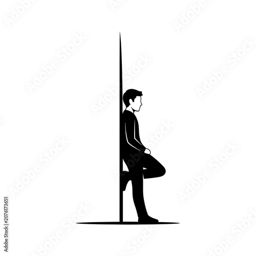 Businessman standing with one leg bent.