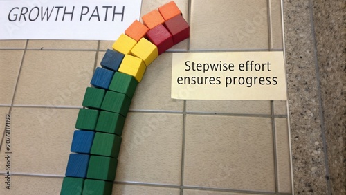 Colorful Growth Path with Blocks on Floor Representing Stepwise Effort and Progress in Education or Personal Development Journey
