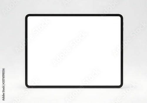 Modern minimalist tablet device with rounded corners on gray surface