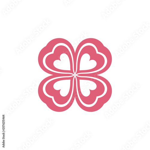 Four-leaf clover formed by pink hearts love symbol.