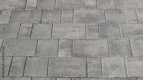 Konstfotografi The texture of gray paving slabs of varying sizes