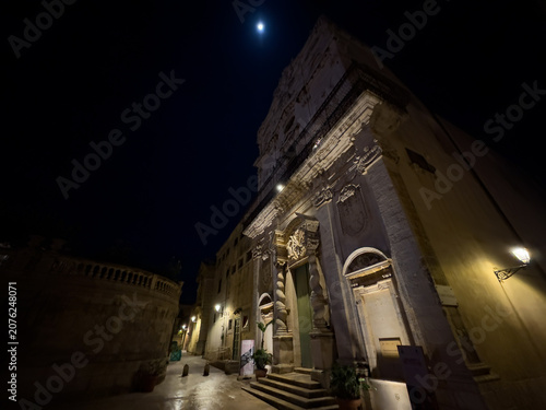 Night view of Santa Lucia alla Badia Church in Piazza Duomo in Siracusa, Italy