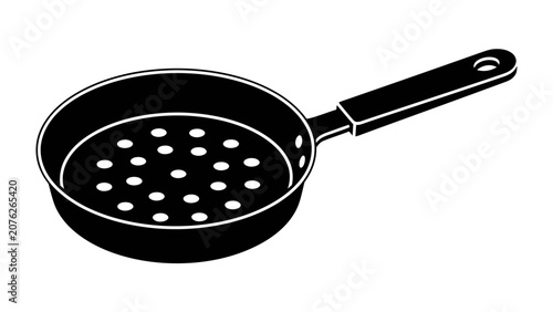 Fotografi Frying Pan with Holes: A graphic representation of a black frying pan, featuring a perforated surface and a long handle, perfect for draining liquids or cooking delicate ingredients