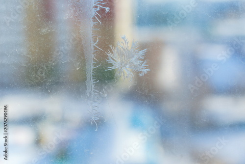 Snowflake on a winter window