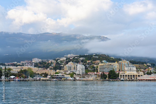 Photos Morning fog over the mountains and calm sea off the coast of Yalta