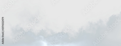 Φωτογραφία Cloud formation with soft shapes and gentle colors floating in the sky during da