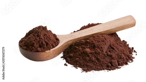 Wooden spoon with cocoa powder pile