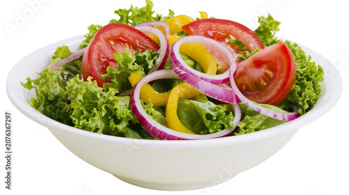 Fresh garden salad with lettuce tomato onion, and bell pepper in a white bowl