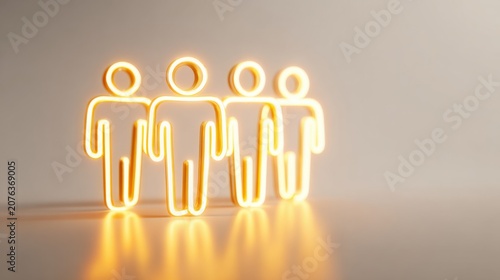 A group of four illuminated figures standing together, representing unity and collaboration