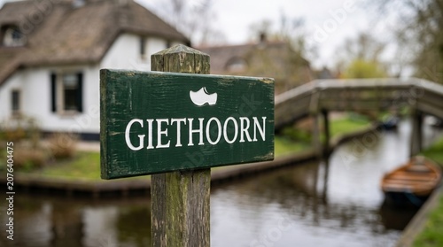 Giethoorn Village Sign by Canal and Bridge
