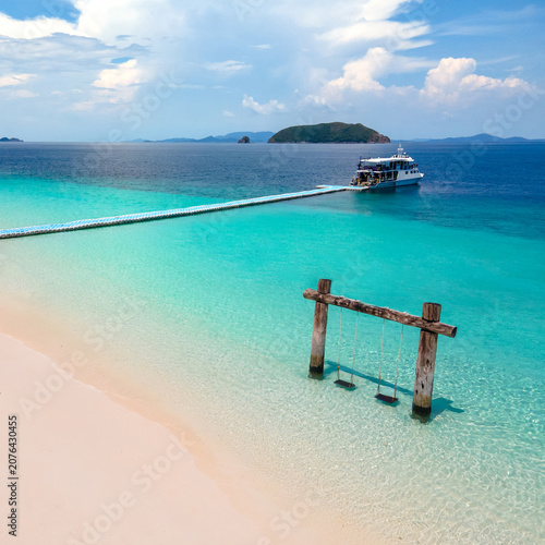 Принти на полотні Empty twin wooden swing on Madam beach of Nyaung Oo Phee Island in Myanmar or Burma