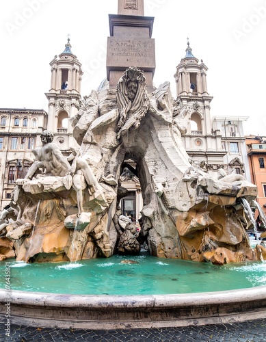 Majestic stone lion statue in historic European square.