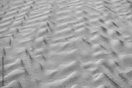 Vászonkép Black and white background pattern of naturally formed sand