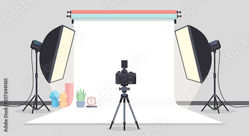 Photography Studio Setup with Camera, Lights, and Backdrop