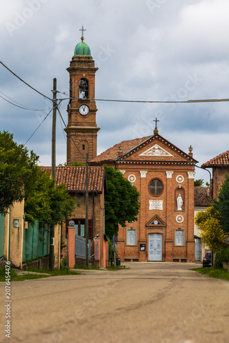Cuadro en lienzo Brick bell tower facade of the Chiesa di Santa Maria in the hamlet of Annunziata
