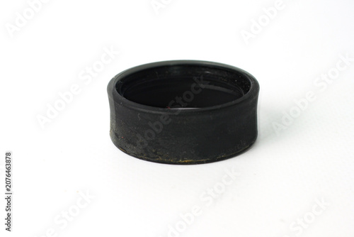 Photos Single rubber eyecup for a microscope eyepiece isolated on a white background