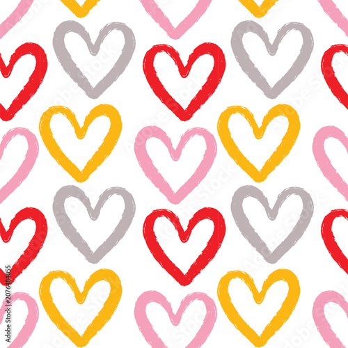 Colorful hand-drawn brush hearts seamless pattern on white background. Romantic doodle heart pattern for Valentine's Day or wedding decor.