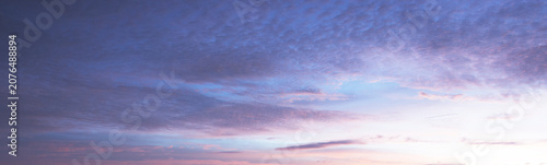 Bild auf Leinwand Serene sunrise sky with soft cirrocumulus clouds