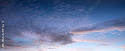 Bild auf Leinwand Serene sunrise sky with soft cirrocumulus clouds