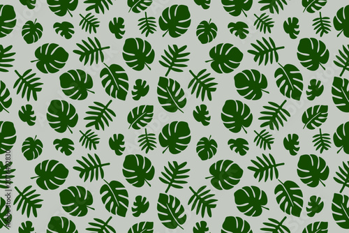 Modern seamless tropical leaf pattern featuring Monstera, palm, and jungle foliage in rich green on a light background. Perfect for fabric, wallpaper, wrapping paper, and textiles.