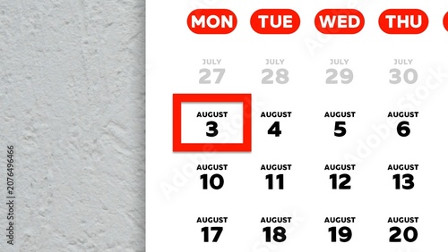 Close-up of August 3rd date marked with a red cursor on a 2026 wall calendar