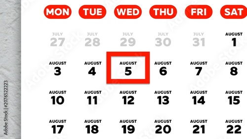 Close-up of August 5th date marked with a red cursor on a 2026 wall calendar