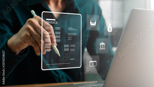 Business professional reviewing digital invoice documents on tablet and laptop with virtual billing interface for accounting, payment verification and financial workflow management.